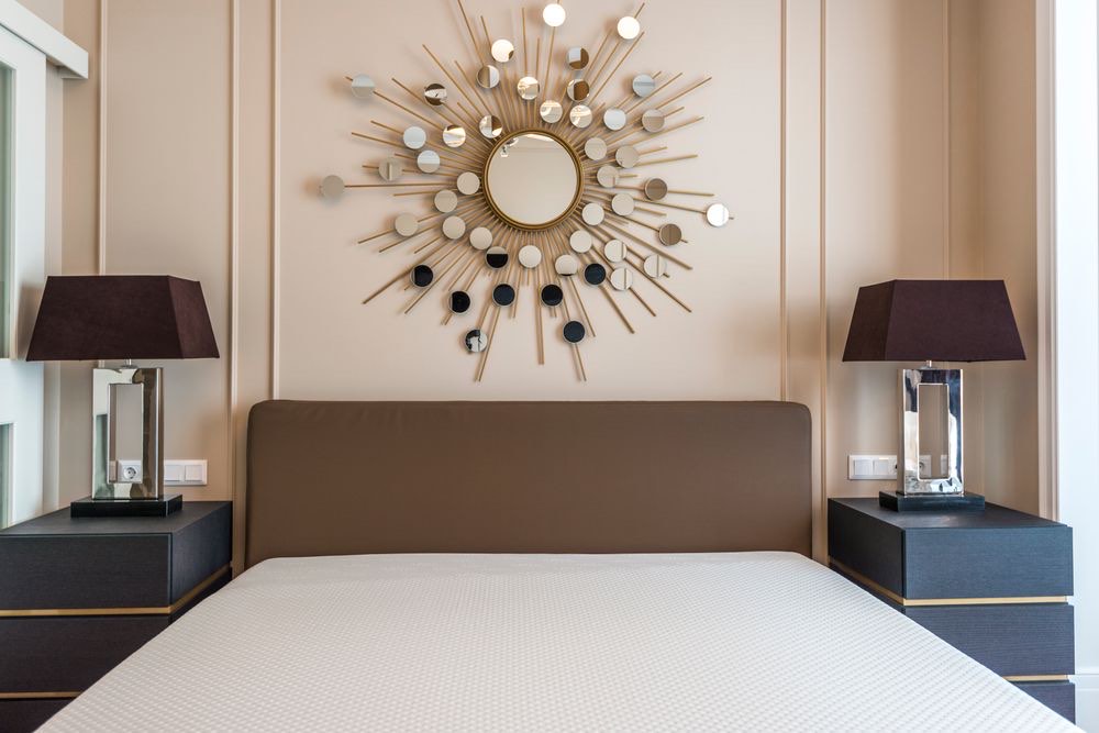 A boutique hotel guest room in warm beige tones
